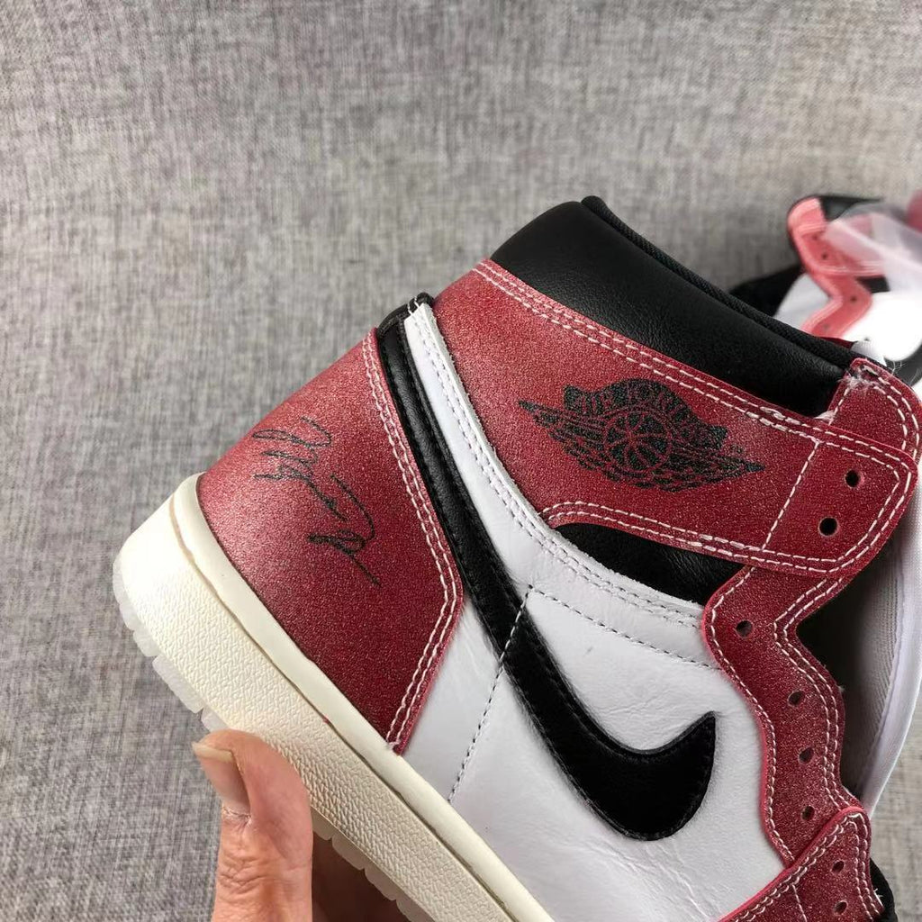 Jordan Trophy Room Air Jordan 1 High OG Sneakers in Red White Black DA2728-100 - product image from the listing.