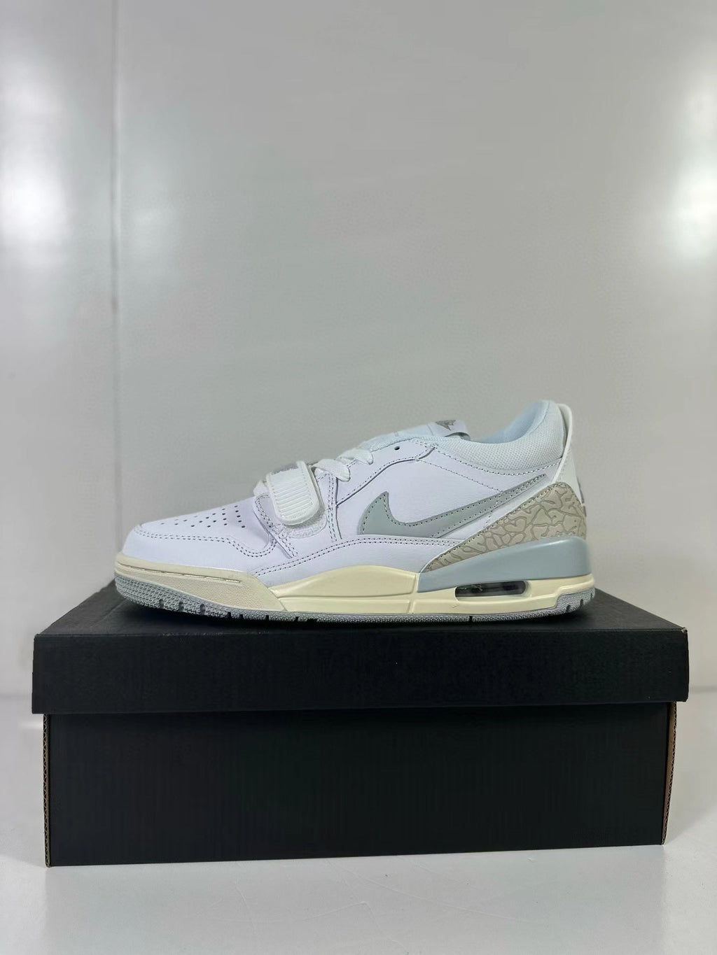 Jordan Legacy 312 Low Sneakers in Silver Yellow HJ3480-101 - product image from the listing.