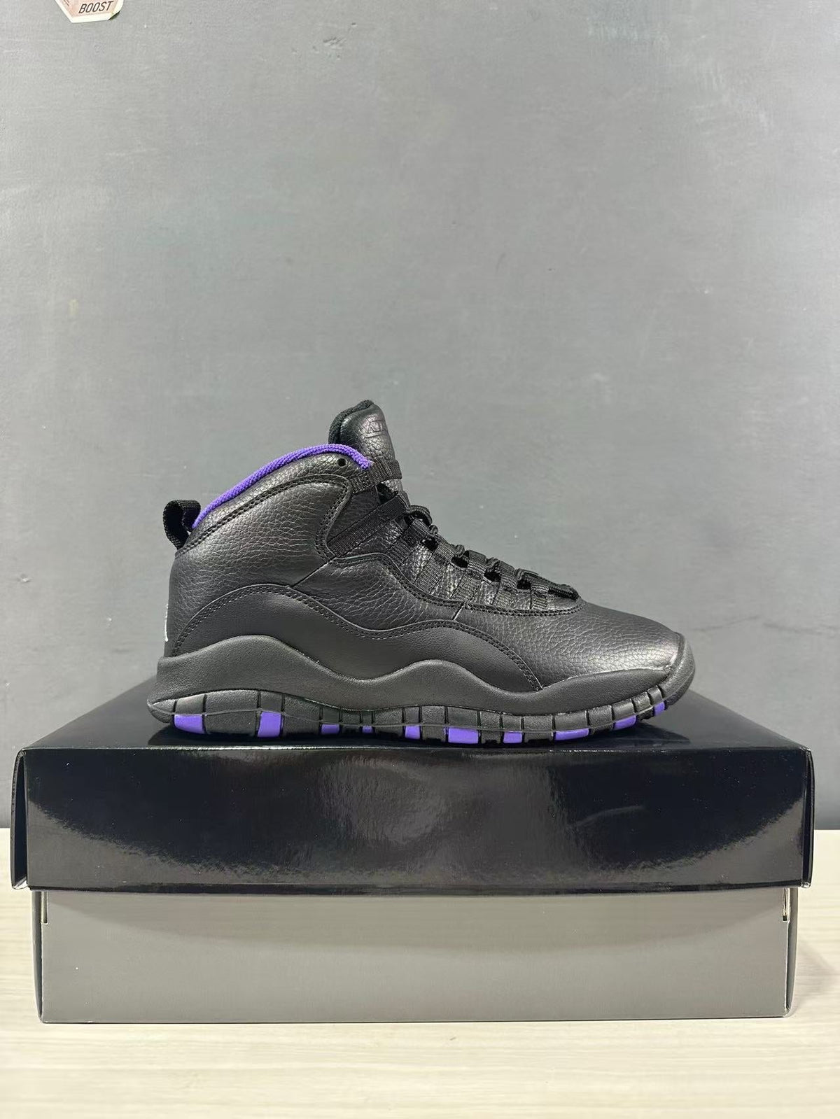 Air Jordan 10 High-Top Sneakers Black Purple 130209-051 - product image from the listing.