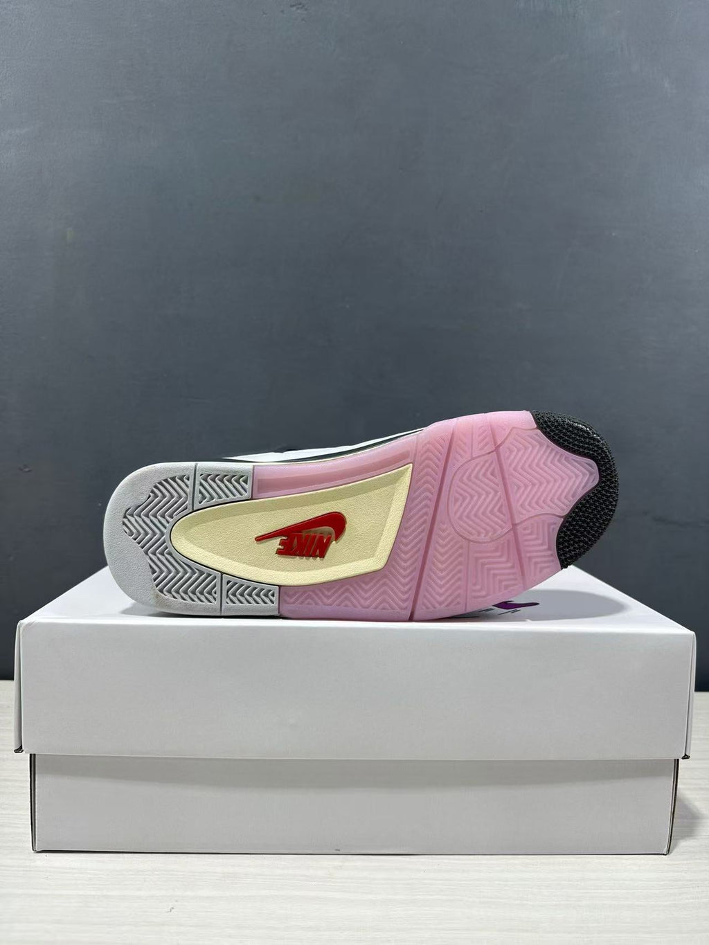 Air Jordan 4 Retro Comic Sneakers White Black Pink JA1135-100 - product image from the listing.