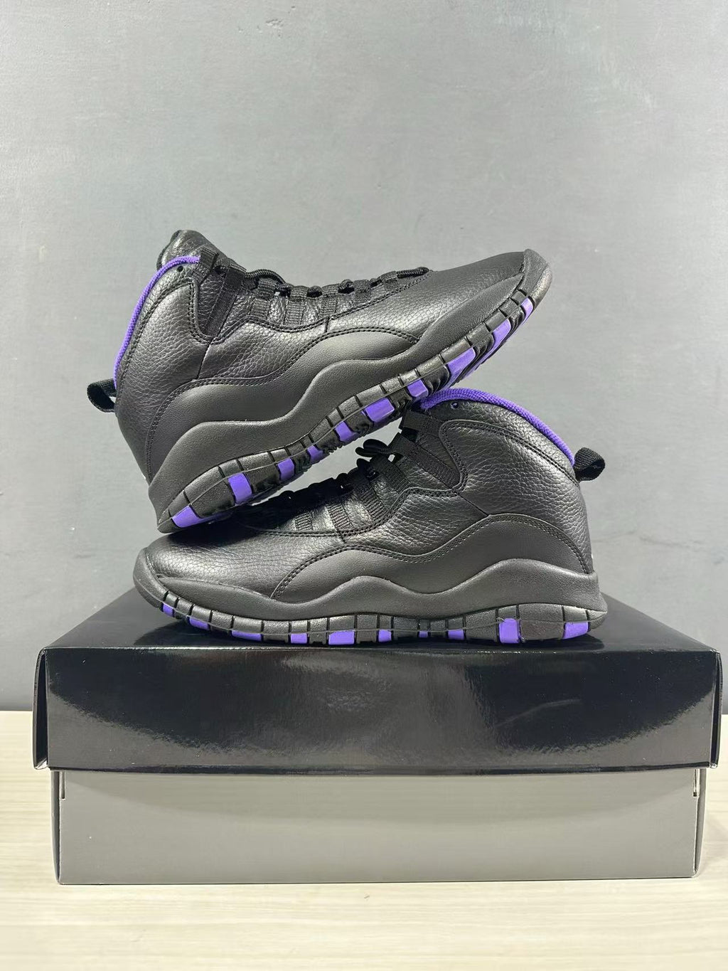 Air Jordan 10 High-Top Sneakers Black Purple 130209-051 - product image from the listing.