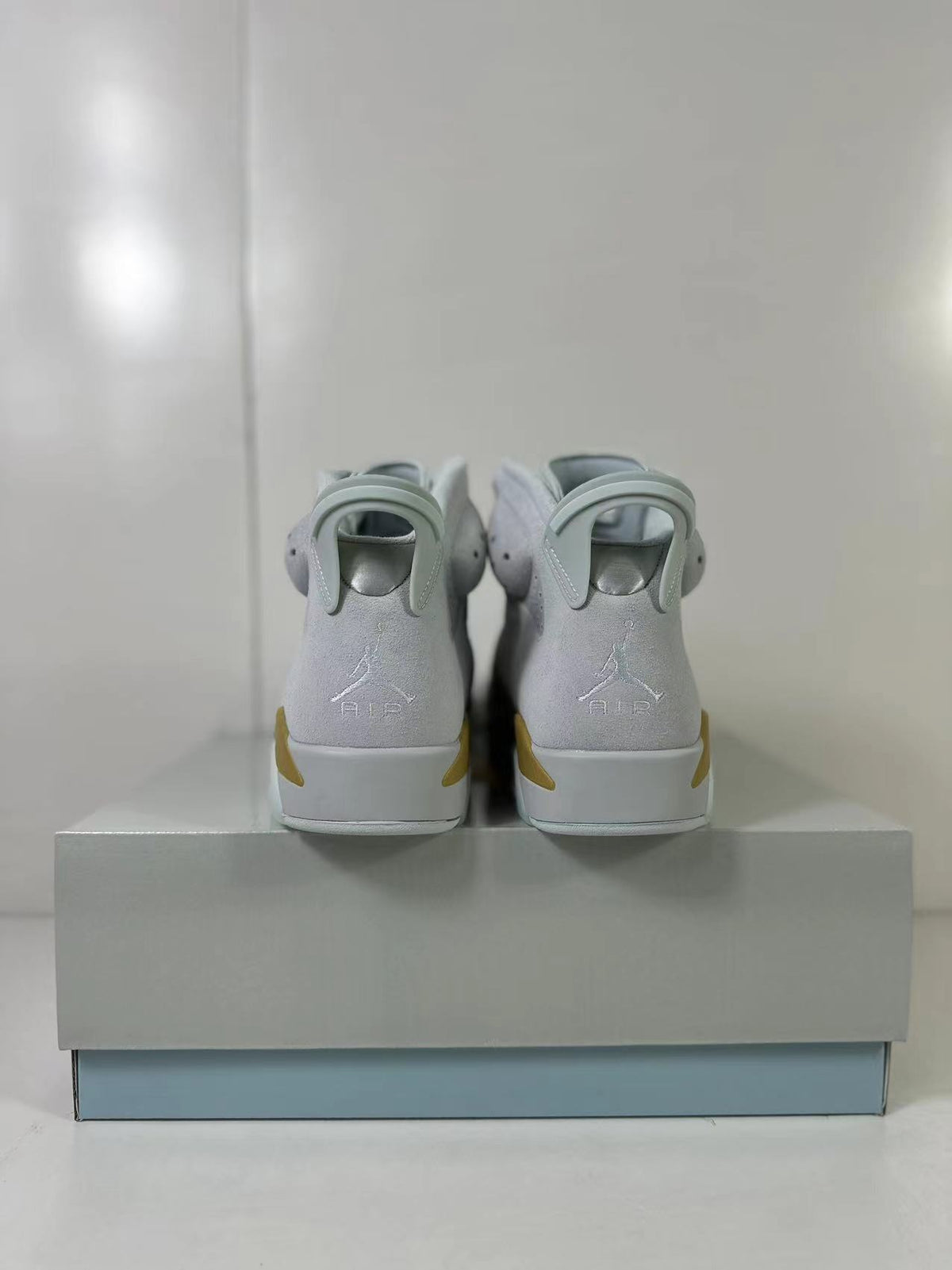 Air Jordan 6 High Sneakers White Gold Glacier Blue DQ4914-074 - product image from the listing.