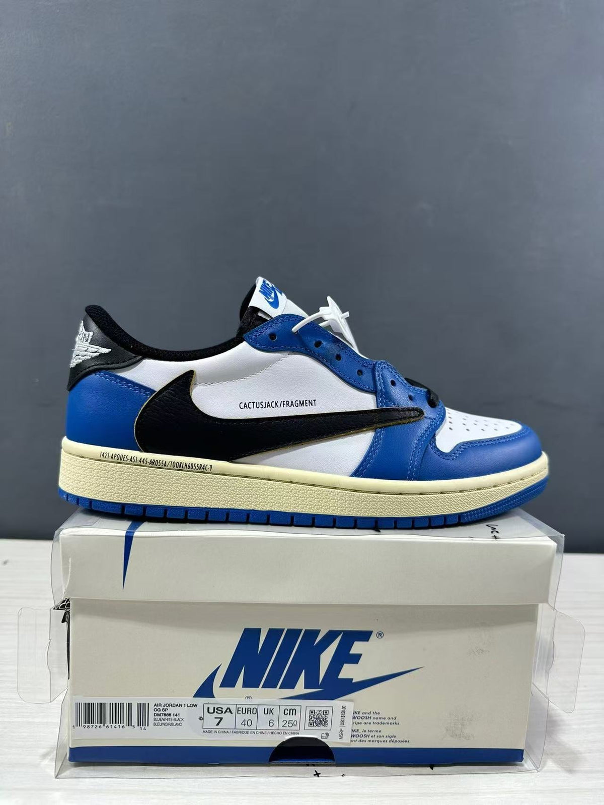 Jordan 1 Low Travis Scott Fragment in Blue White DM7866-141 - product image from the listing.
