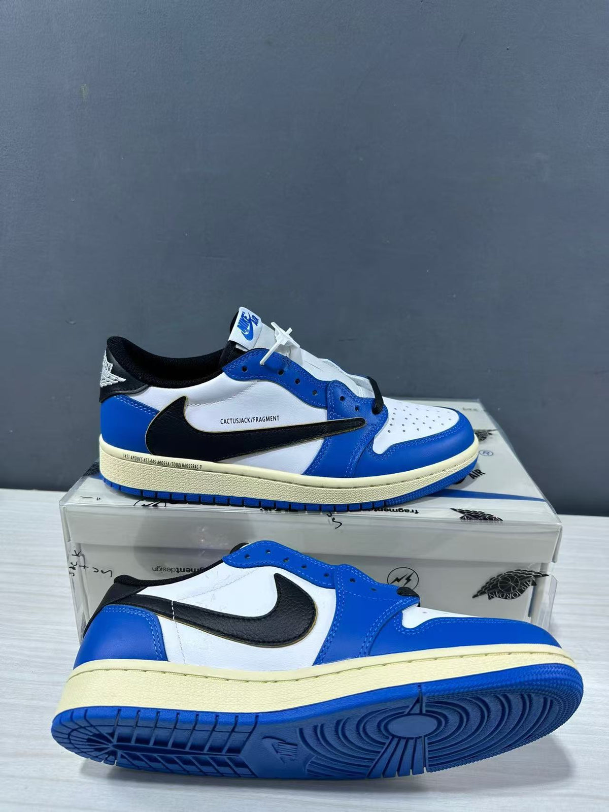 Jordan 1 Low Travis Scott Fragment in Blue White DM7866-141 - product image from the listing.