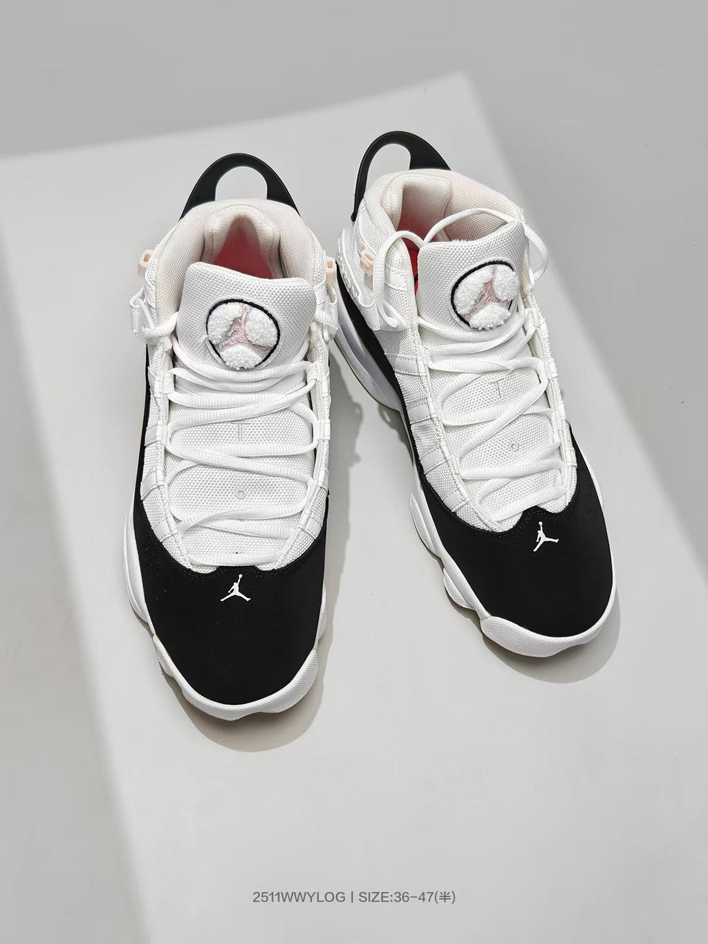 Jordan 8 Sneakers in White Black Pink - product image from the listing.