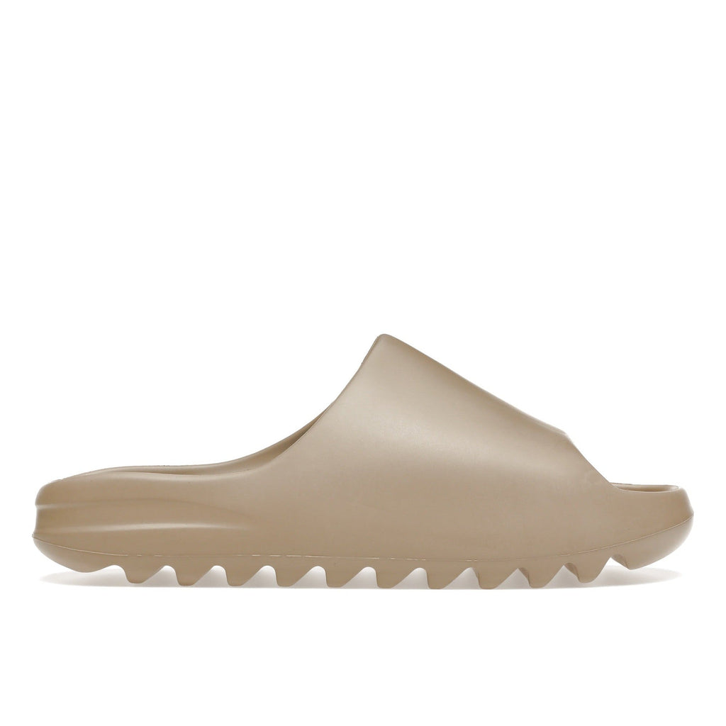 "Pure" Adidas Yeezy Slide (1st Release - GZ5554) - product image from the listing.