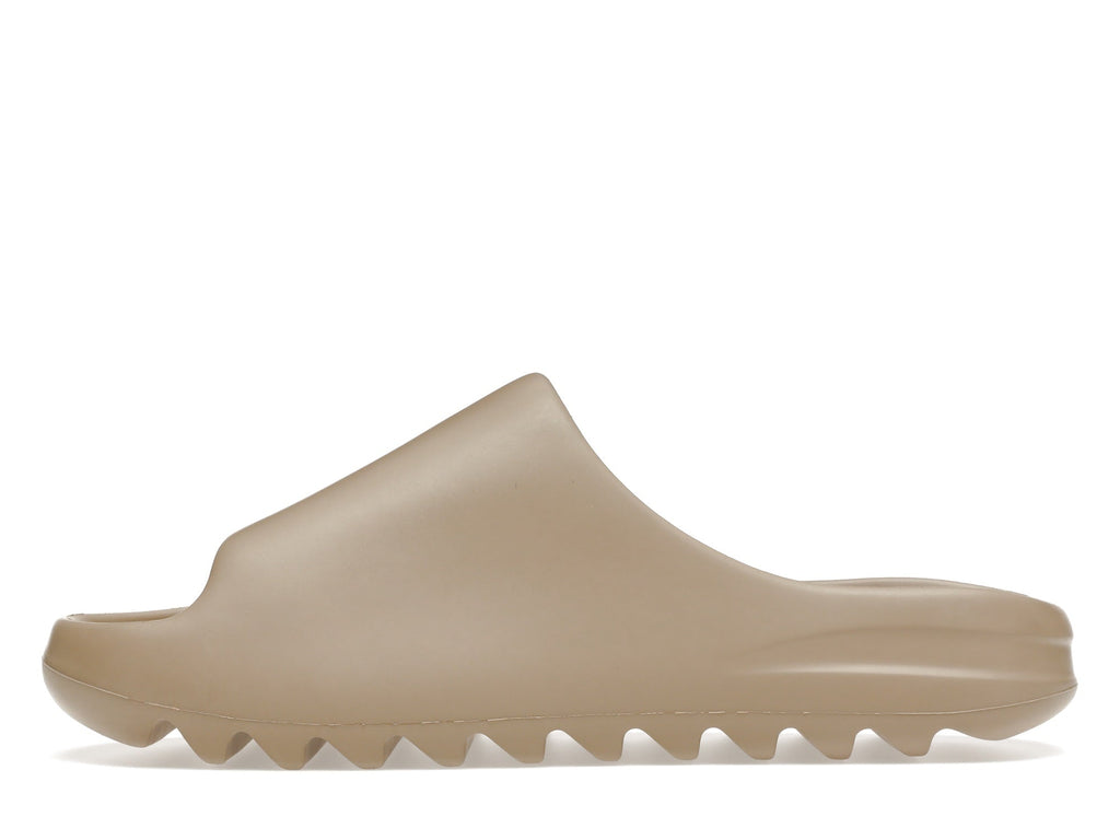 "Pure" Adidas Yeezy Slide (1st Release - GZ5554) - product image from the listing.