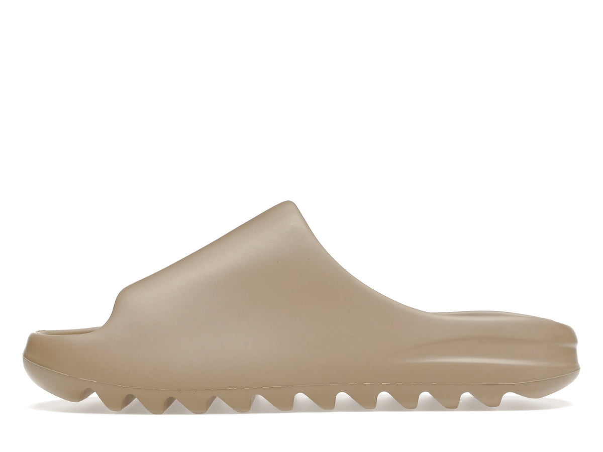 "Pure" Adidas Yeezy Slide (1st Release - GZ5554) - product image from the listing.