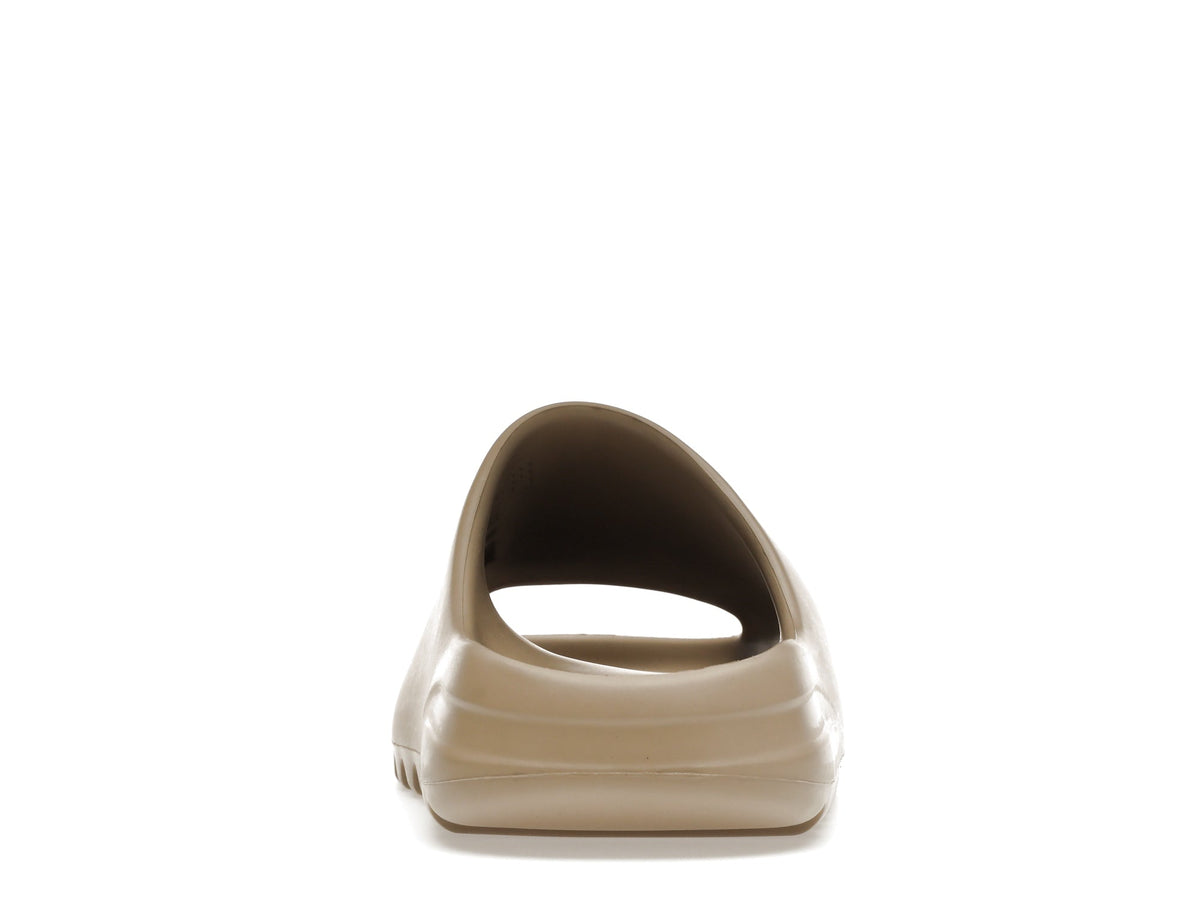 "Pure" Adidas Yeezy Slide (1st Release - GZ5554) - product image from the listing.